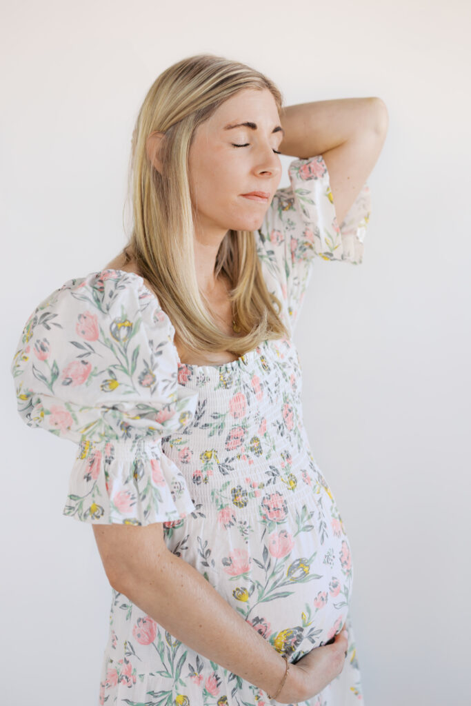 maternity photos outfit ideas - white and pink floral dress 
