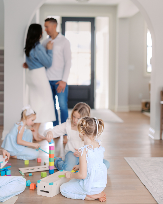 family of 6 play in their edina home during their in-home edina family photography session