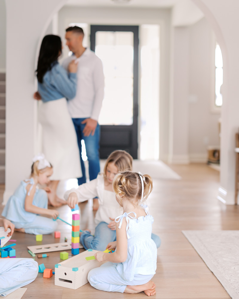 family of 7 play in their edina, mn kitchen for their edina, minnesota family photography session with angela watts photography
