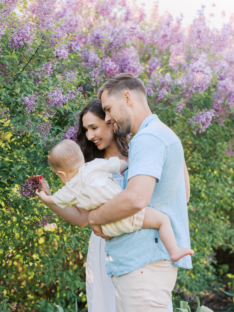 family of 3 at lyndale park gardens by the liacs for their minneapolis family photography session